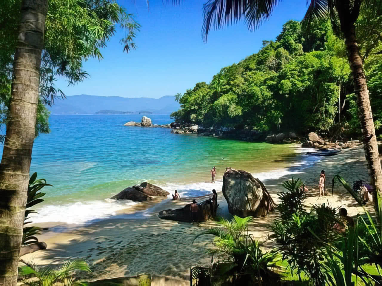 Imagem da Ilha das Couves, localizada no litoral norte de São Paulo. A ilha é um destino turístico popular por suas águas cristalinas e praias paradisíacas.